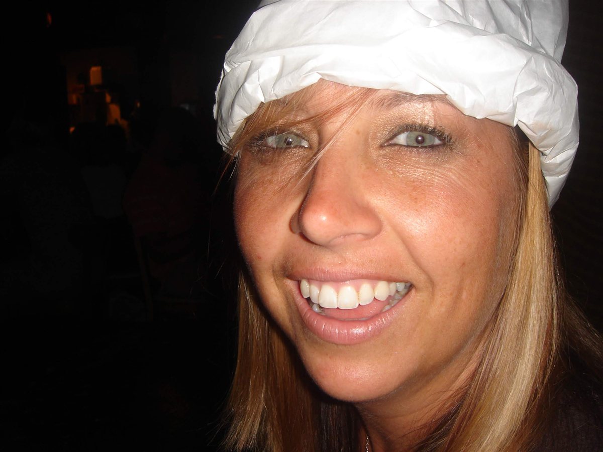 Mary with bag on head