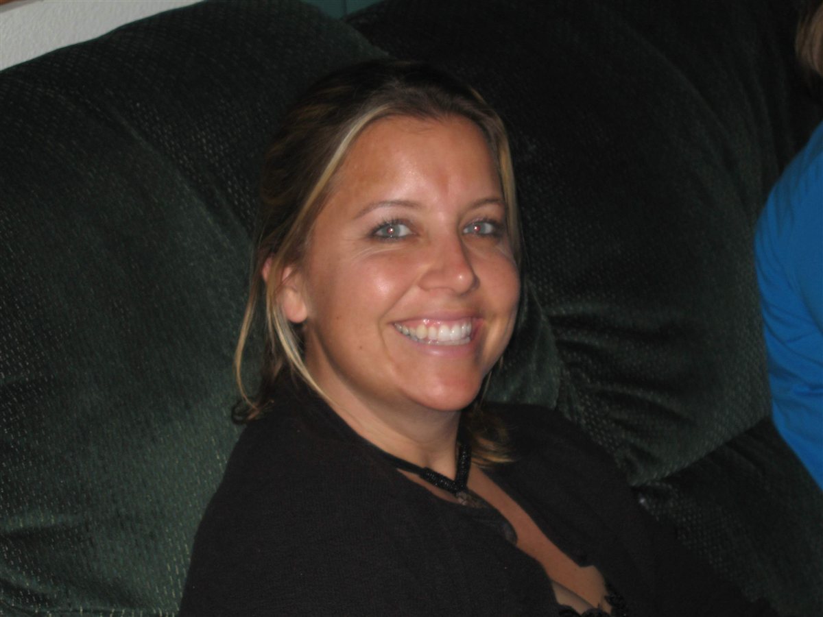 Mary smiling on couch